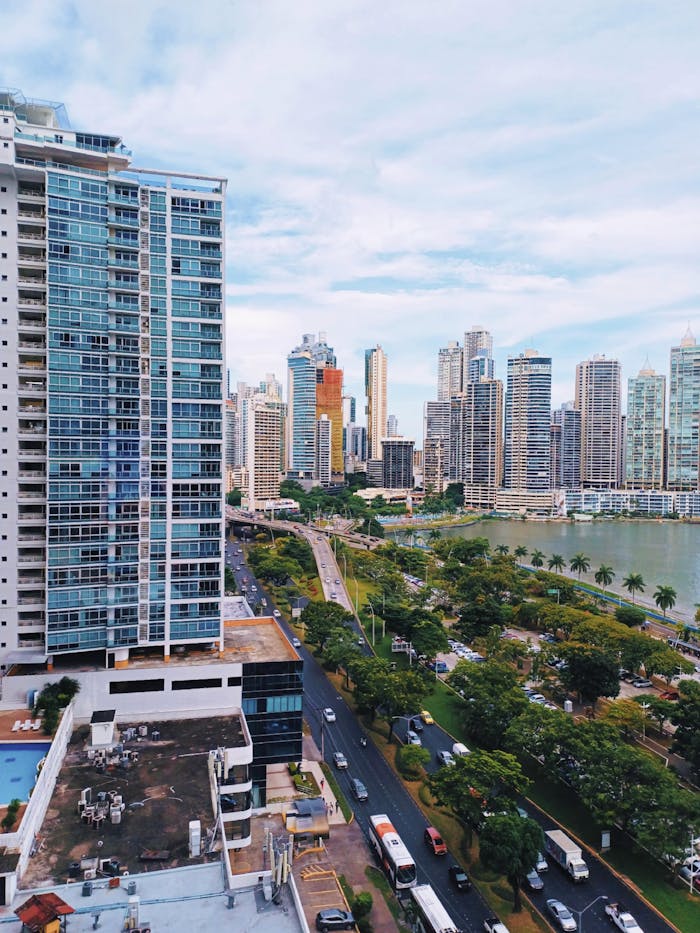 why-choose-us Aerial view of Panama City's skyline showcasing modern skyscrapers and vibrant urban life.